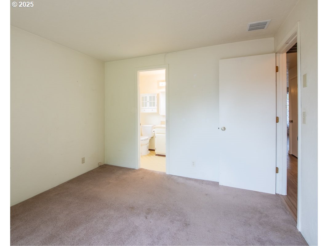 4631 Daisy Street Springfield, OR 97478 - Photo 20 of 46 a view of an empty room and a window