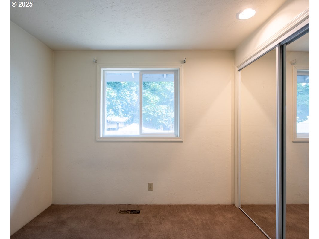 4631 Daisy Street Springfield, OR 97478 - Photo 29 of 46 an empty room with windows