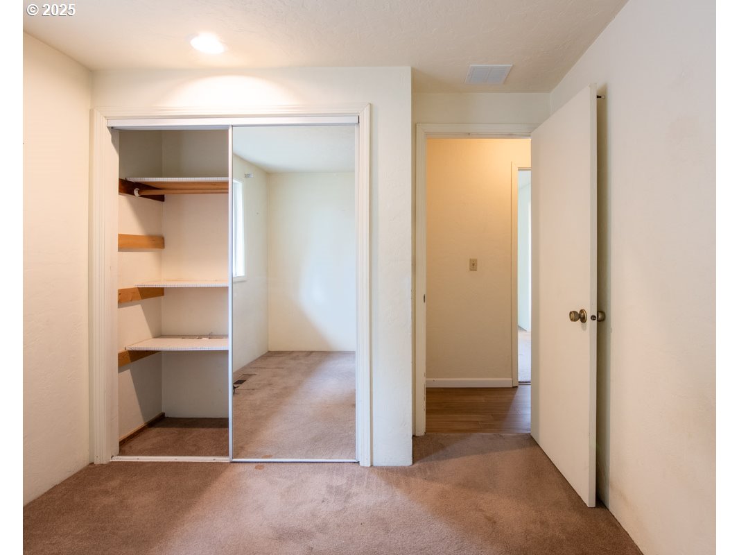 4631 Daisy Street Springfield, OR 97478 - Photo 31 of 46 a view of an empty room with closet and a window