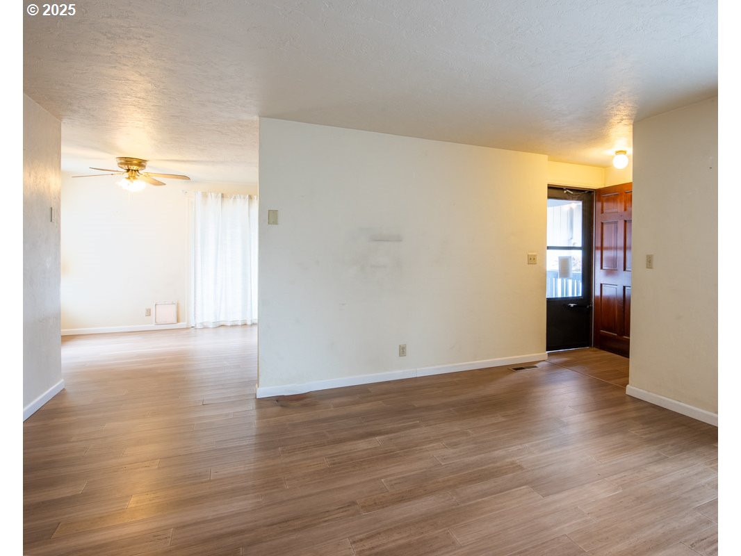 4631 Daisy Street Springfield, OR 97478 - Photo 8 of 46 a view of a room with wooden floor