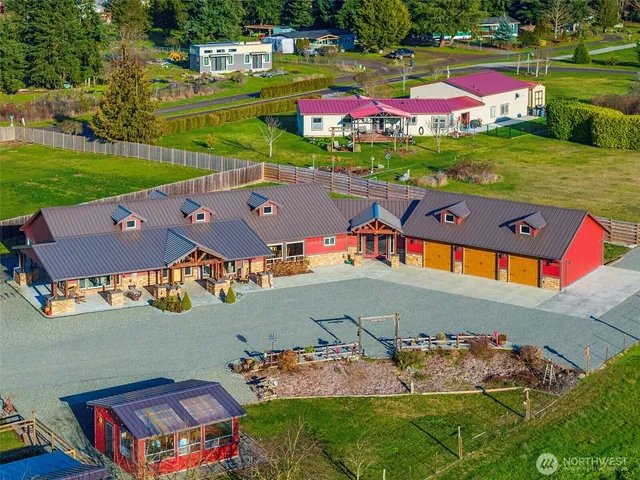 an aerial view of a houses with outdoor space
