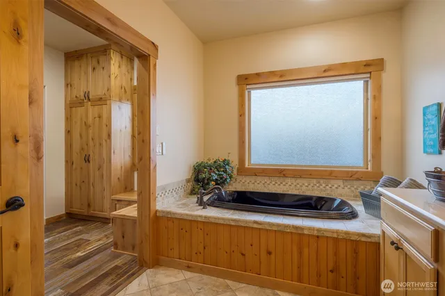 a room with furniture and wooden floor