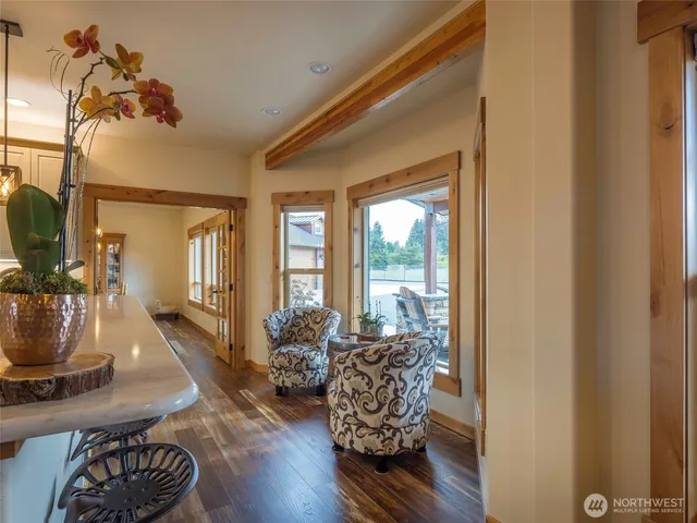 a bathroom with sink a mirror and shower
