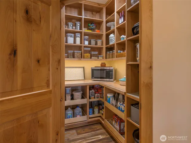 a view of a livingroom with table and chair