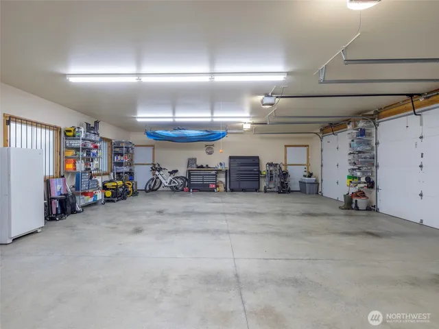 a backyard of a house with outdoor seating and green space