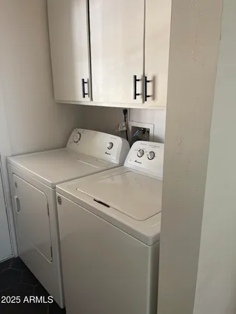 a view of empty room with a fireplace