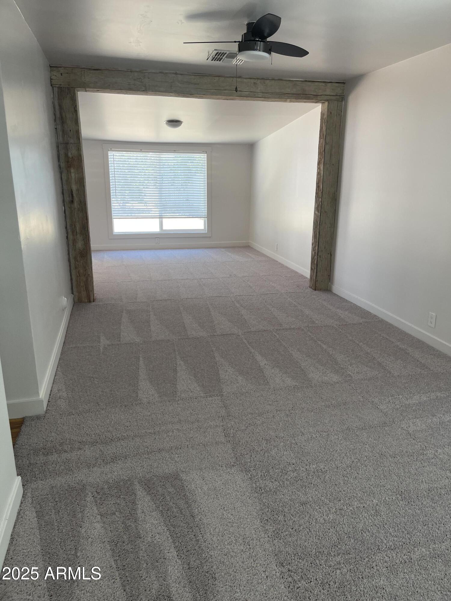 106 East Linda Lane Gilbert, AZ 85234 - Photo 12 of 21 a view of empty room with a fireplace