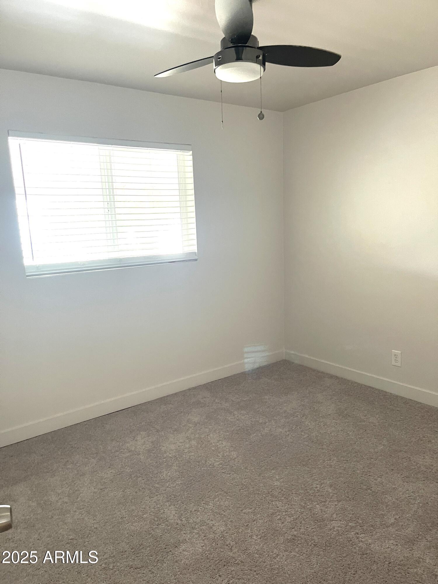 106 East Linda Lane Gilbert, AZ 85234 - Photo 13 of 21 an empty room with a window