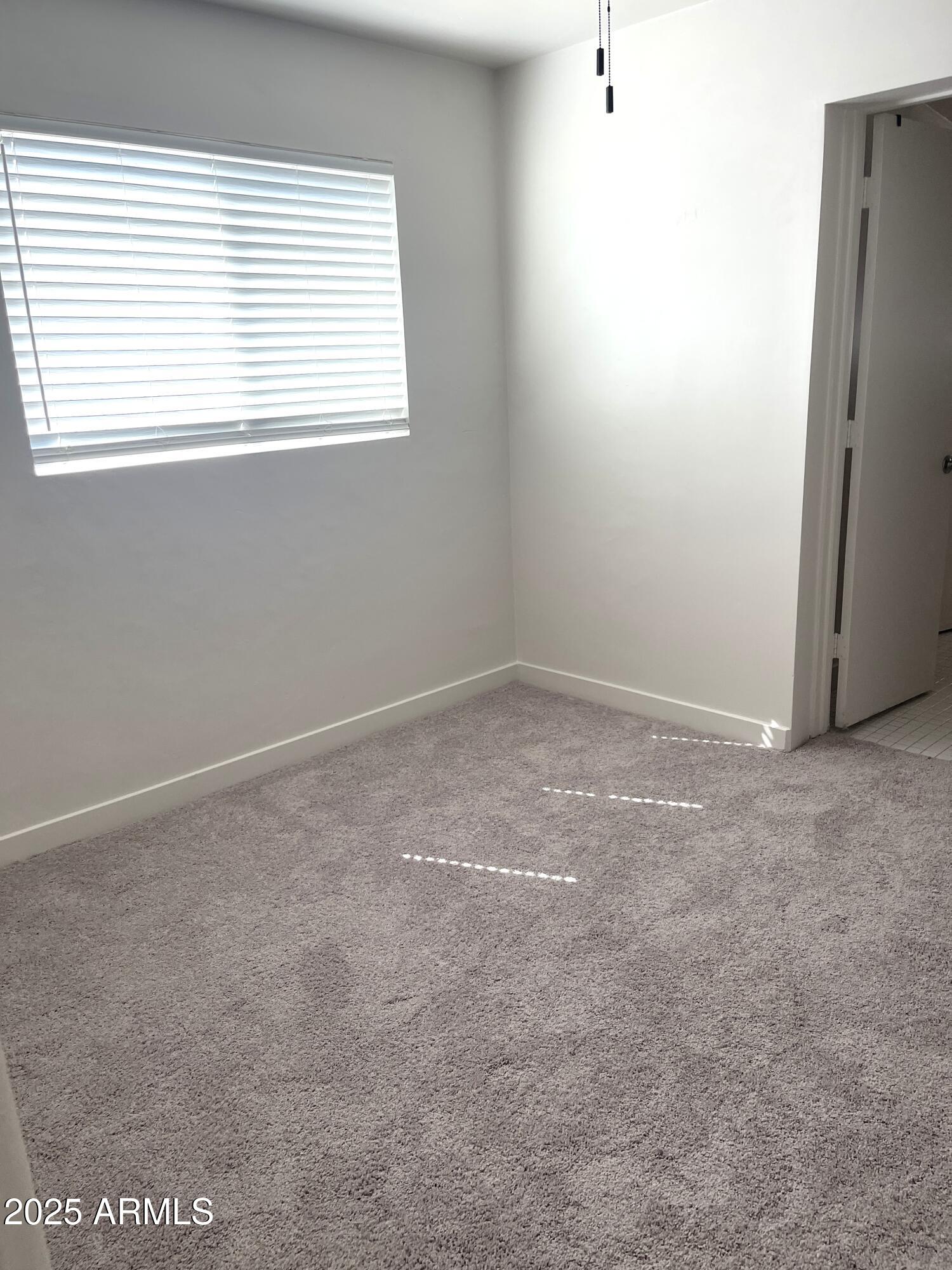 106 East Linda Lane Gilbert, AZ 85234 - Photo 15 of 21 a view of an empty room with a window