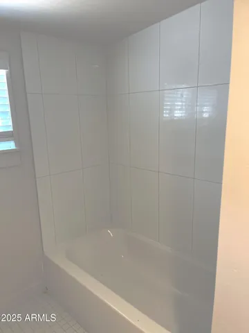 a bathroom with a sink a vanity and a mirror