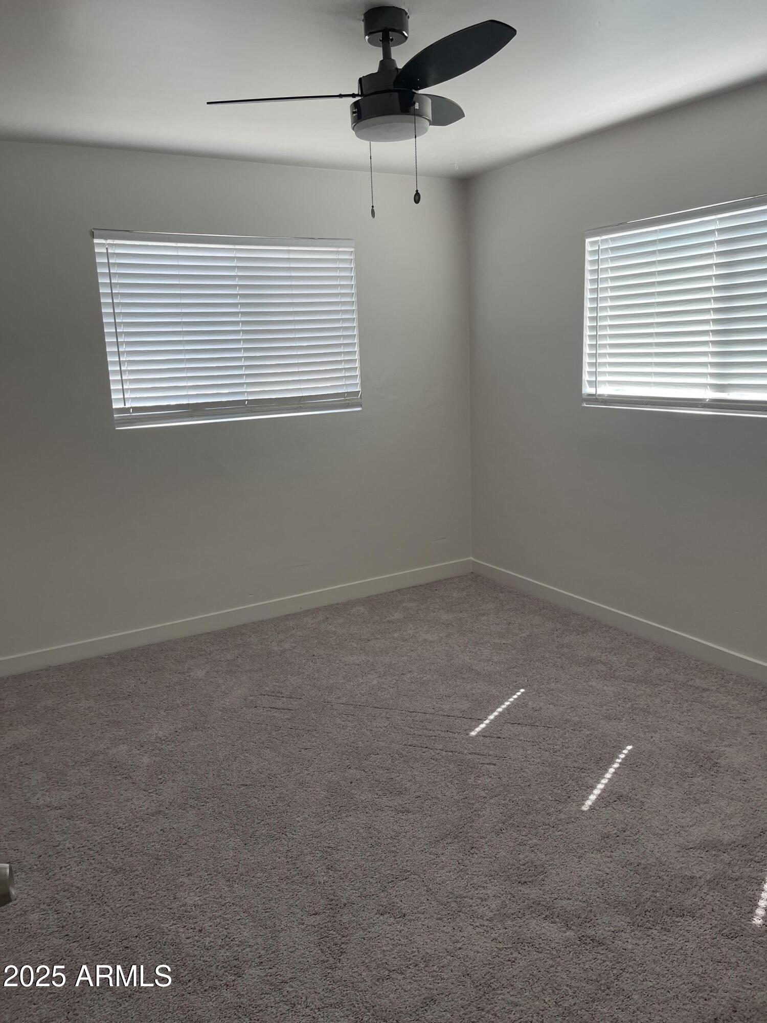 106 East Linda Lane Gilbert, AZ 85234 - Photo 19 of 21 a view of a room that has a window in it