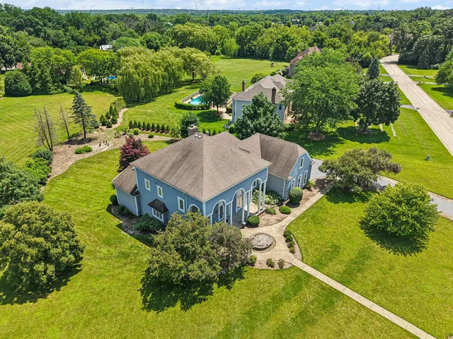 a bathroom with a sink mirror and toilet