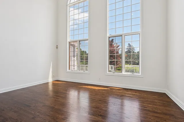 a front view of a house with a large window