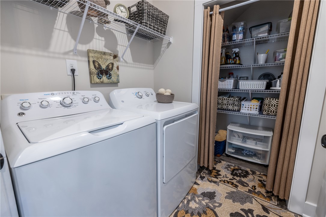 135 Bowers Estates Road Hartwell, GA 30643 - Photo 25 of 35 This dedicated laundry space offers practical convenience for daily chores.
