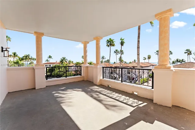 a view of a bedroom with a large window