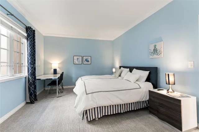 a bathroom with a double vanity sink toilet mirror and bathtub