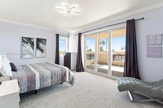 a spacious bedroom with a large bed and a large window