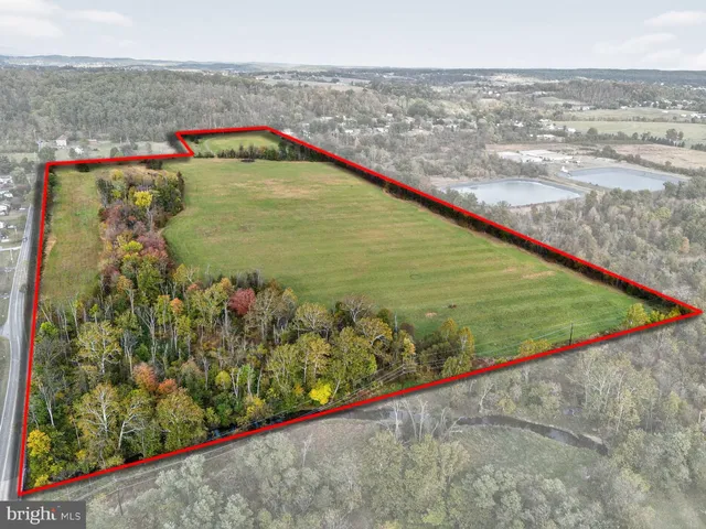 a view of swimming pool from a balcony