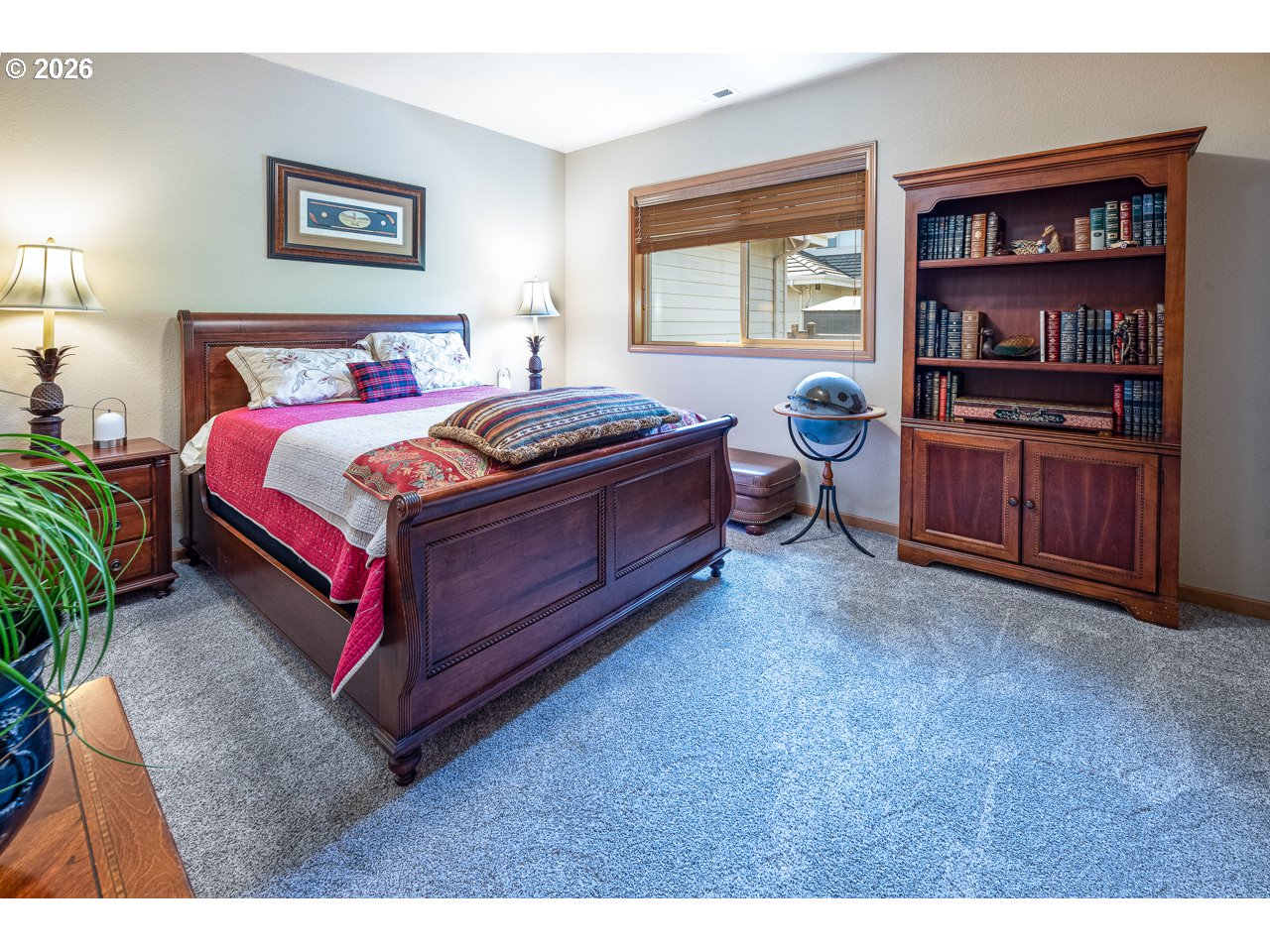 3381 Rosemont Way Eugene, OR 97401 - Photo 29 of 45 a bed room with a bed and a book shelf