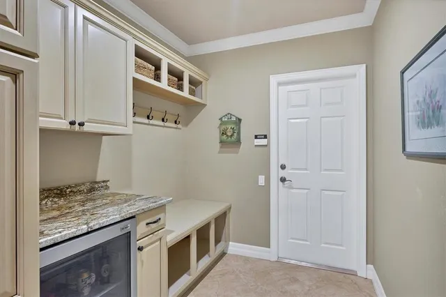 a kitchen with stainless steel appliances granite countertop a stove and a refrigerator