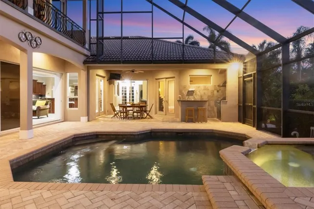 a view of a house with a swimming pool