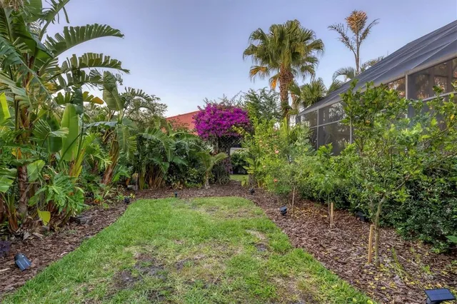 a view of a lake with a house in the background