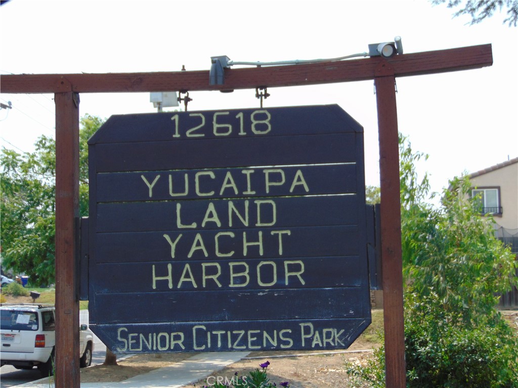12618 3rd Street, Unit 63 Yucaipa, CA 92399 - Photo 11 of 65 a sign on the side of a building