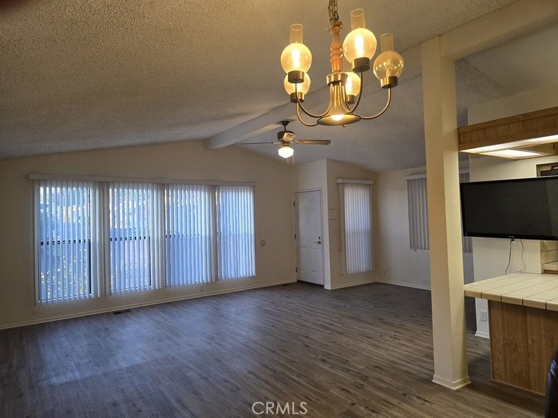 12618 3rd Street, Unit 63 Yucaipa, CA 92399 - Photo 12 of 65 a view of a livingroom with wooden floor