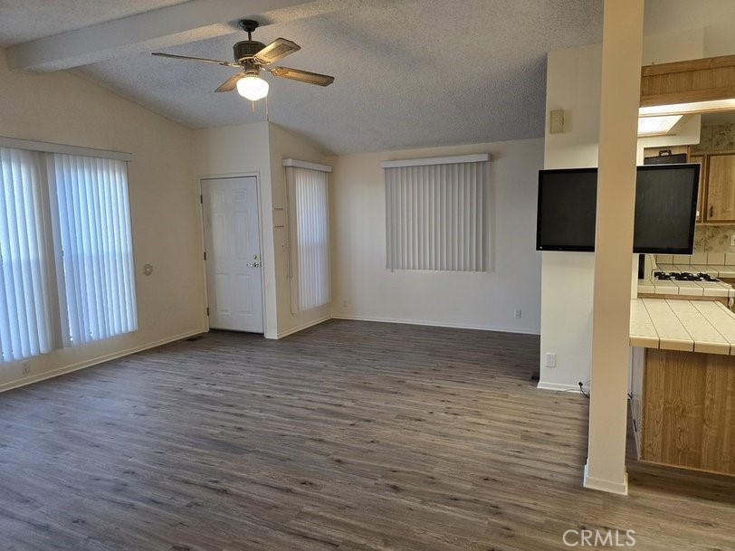 12618 3rd Street, Unit 63 Yucaipa, CA 92399 - Photo 13 of 65 a view of a livingroom with a flat screen tv