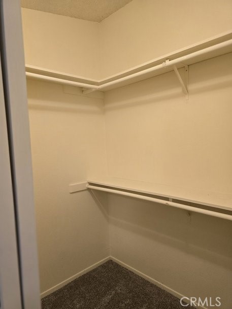 12618 3rd Street, Unit 63 Yucaipa, CA 92399 - Photo 35 of 70 walk in closet guest bedroom