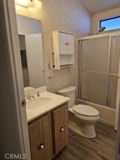 12618 3rd Street, Unit 63 Yucaipa, CA 92399 - Photo 38 of 65 a bathroom with a sink toilet and shower