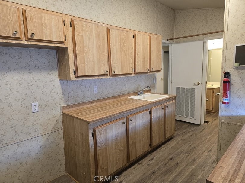 12618 3rd Street, Unit 63 Yucaipa, CA 92399 - Photo 42 of 70 Laundry room, lots of storage, room for a second refrigerator or freezer