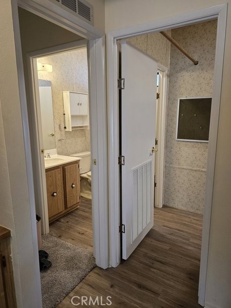 12618 3rd Street, Unit 63 Yucaipa, CA 92399 - Photo 43 of 65 a bathroom with a sink a mirror and a shower