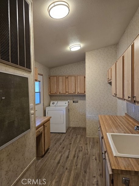 12618 3rd Street, Unit 63 Yucaipa, CA 92399 - Photo 45 of 70 vanity in laundry room and sink, chaulk board too.