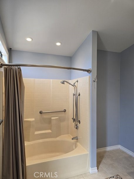 12618 3rd Street, Unit 63 Yucaipa, CA 92399 - Photo 49 of 70 shower over tub, handicap bars in master bath