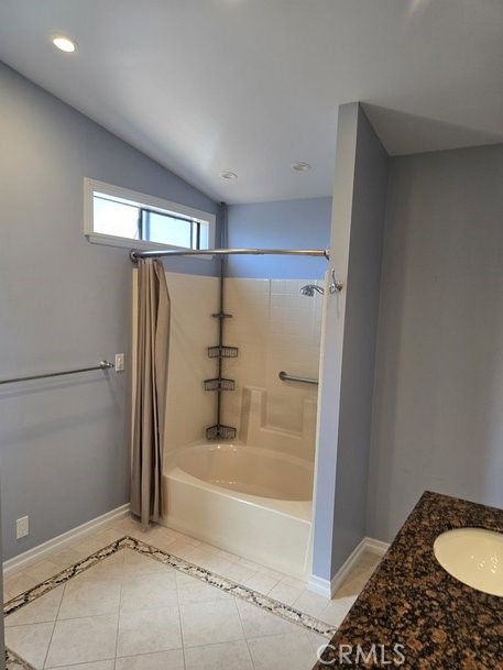 12618 3rd Street, Unit 63 Yucaipa, CA 92399 - Photo 50 of 65 a bathroom with a granite countertop bathtub and shower