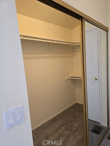 12618 3rd Street, Unit 63 Yucaipa, CA 92399 - Photo 55 of 70 mirrored doors in master walk in closet