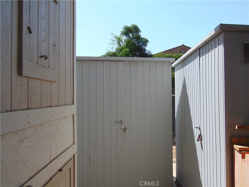 12618 3rd Street, Unit 63 Yucaipa, CA 92399 - Photo 61 of 70 Two sheds at back of driveway