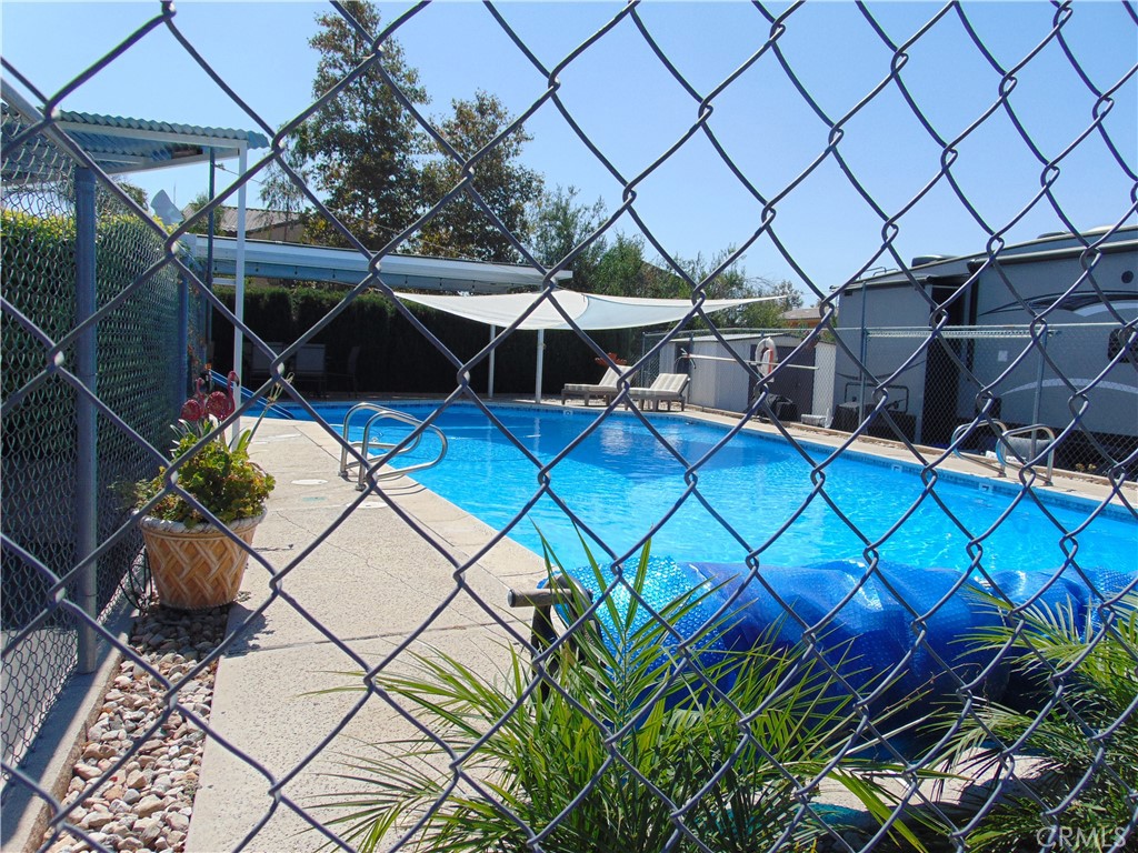 12618 3rd Street, Unit 63 Yucaipa, CA 92399 - Photo 63 of 65 a view of a backyard