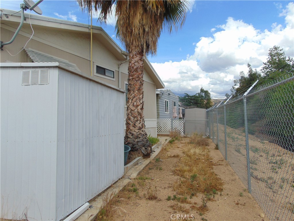 12618 3rd Street, Unit 63 Yucaipa, CA 92399 - Photo 66 of 70 behind the sheds back yard.
