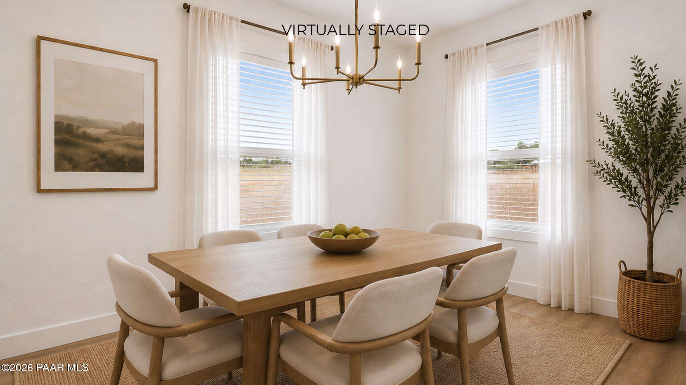 65 Hawaii Road Paulden, AZ 86334 - Photo 11 of 29 a view of a dining room with furniture and wooden floor