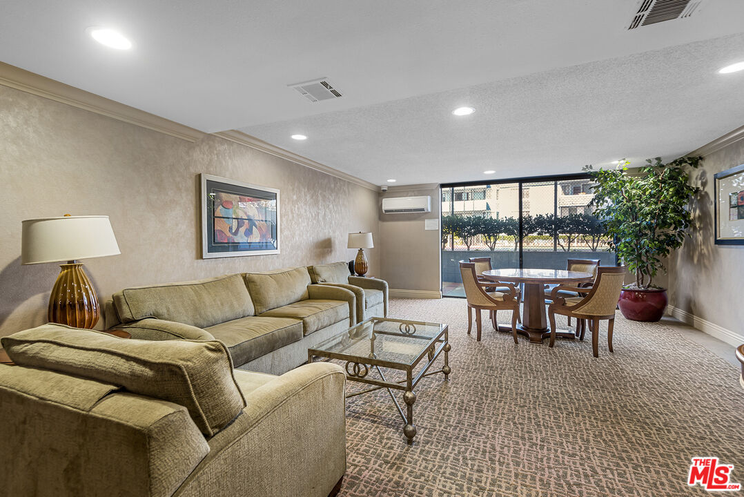311 Bora Bora Way, Unit 3207 Marina del Rey, CA 90292 - Photo 46 of 54 a living room with furniture and a large window