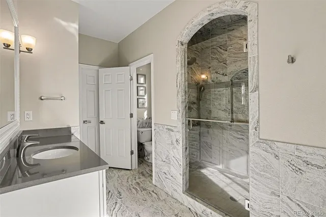 a bathroom with a sink and mirror