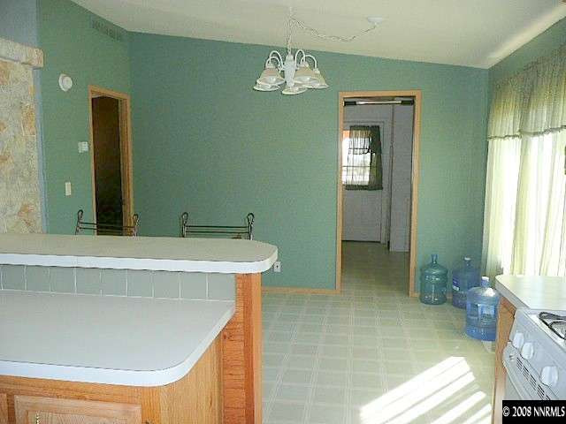 7067 Milburn Lane Fallon, NV 89406 - Photo 8 of 9 a bathroom with a sink and a mirror