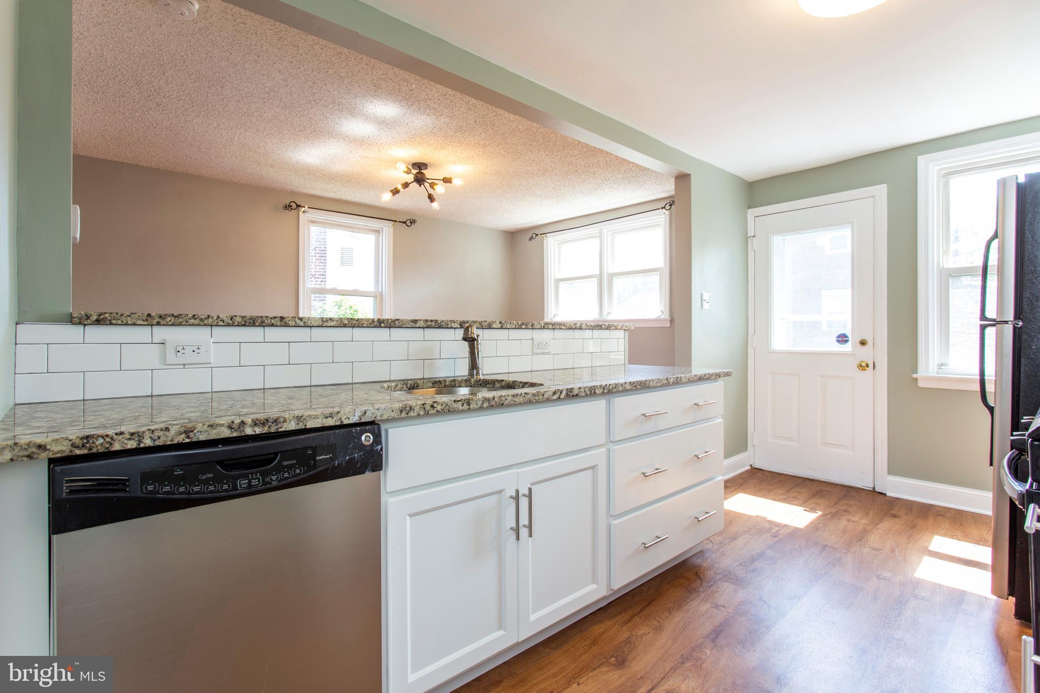 812 Colwell Road Swarthmore, PA 19081 - Photo 8 of 27 Granite Counter Tops~& Sub Way Style Backsplash