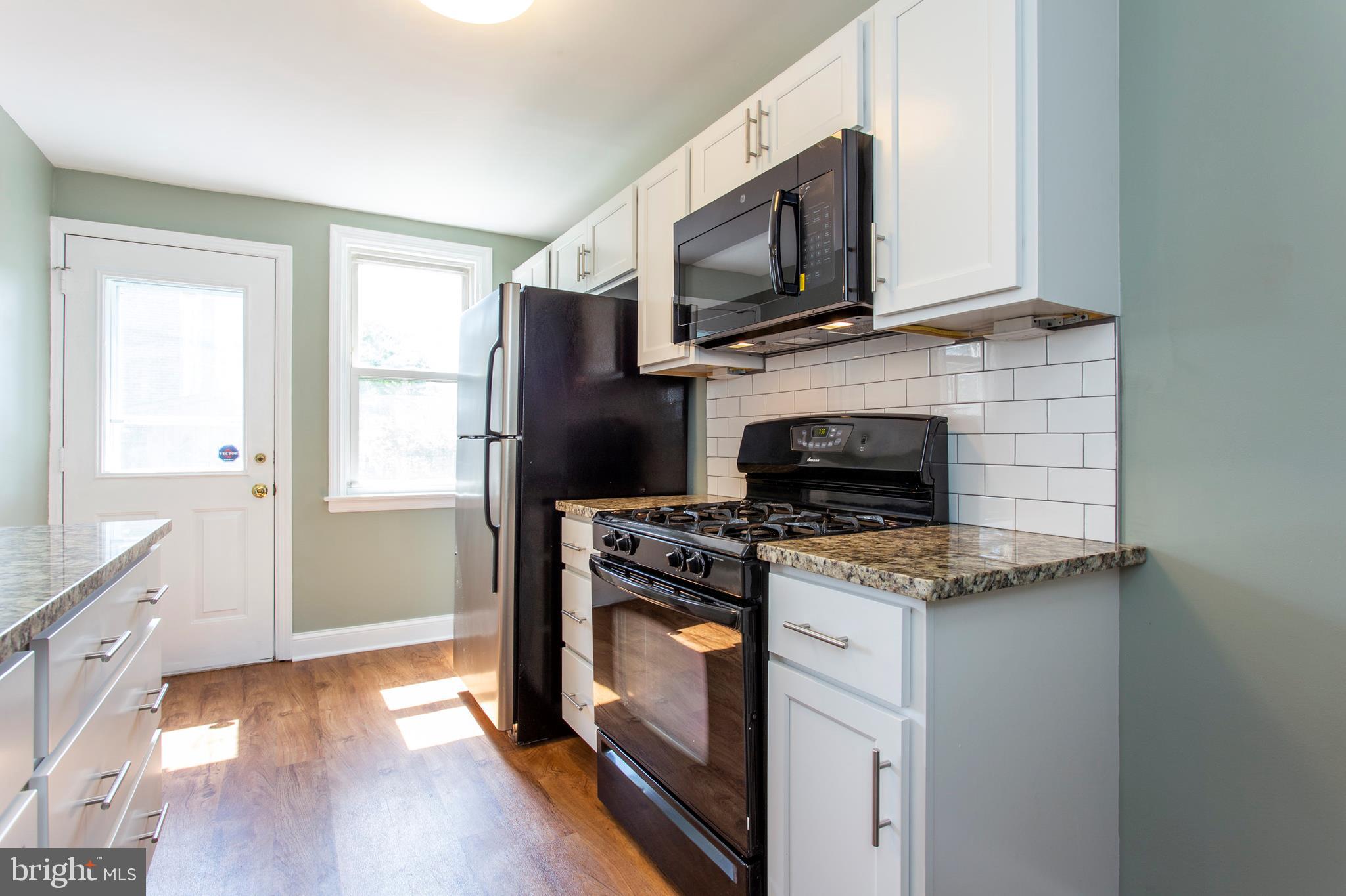 812 Colwell Road Swarthmore, PA 19081 - Photo 9 of 27 Granite Counter Tops~& Sub Way Style Backsplash