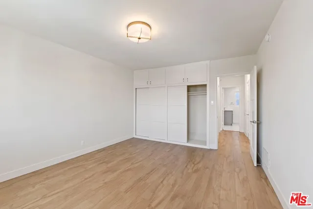 a view of a livingroom with wooden floor