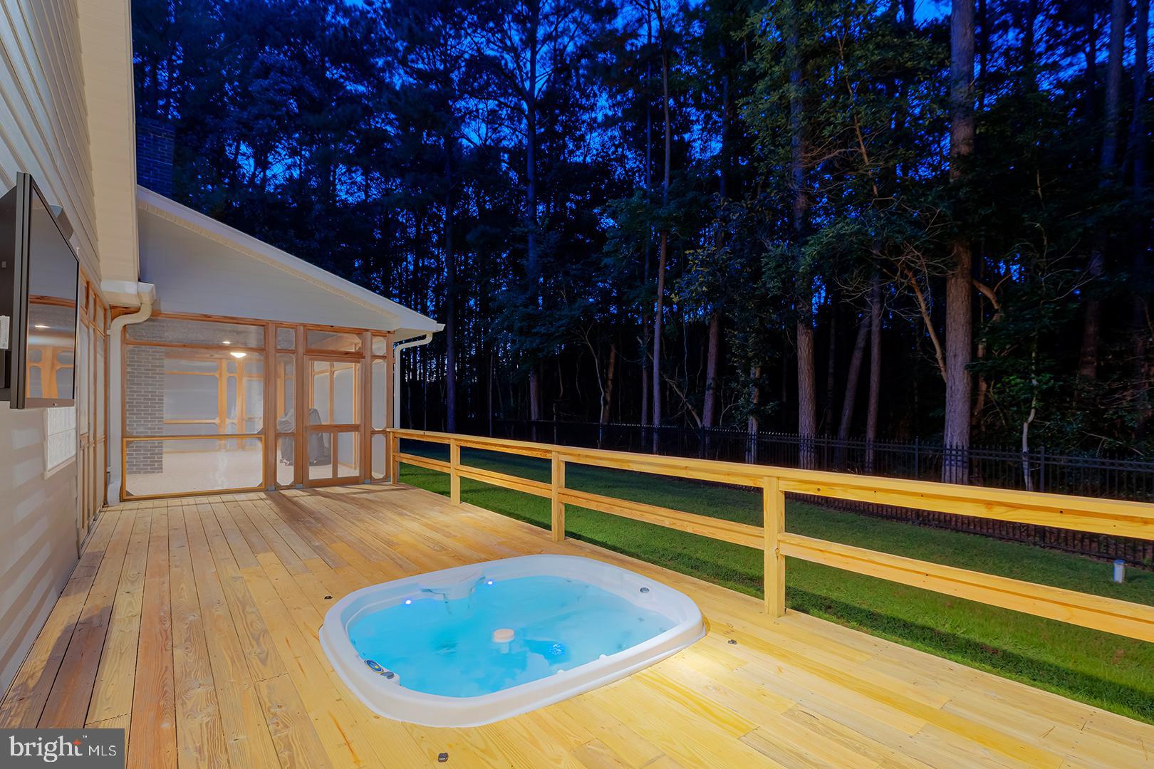 22095 Wilson Road Georgetown, DE 19947 - Photo 109 of 137 a view of swimming pool with seating area and trees