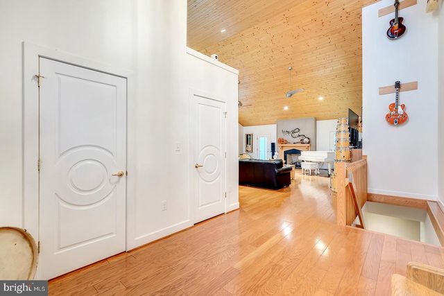 a kitchen with stainless steel appliances white cabinets and a granite counter tops