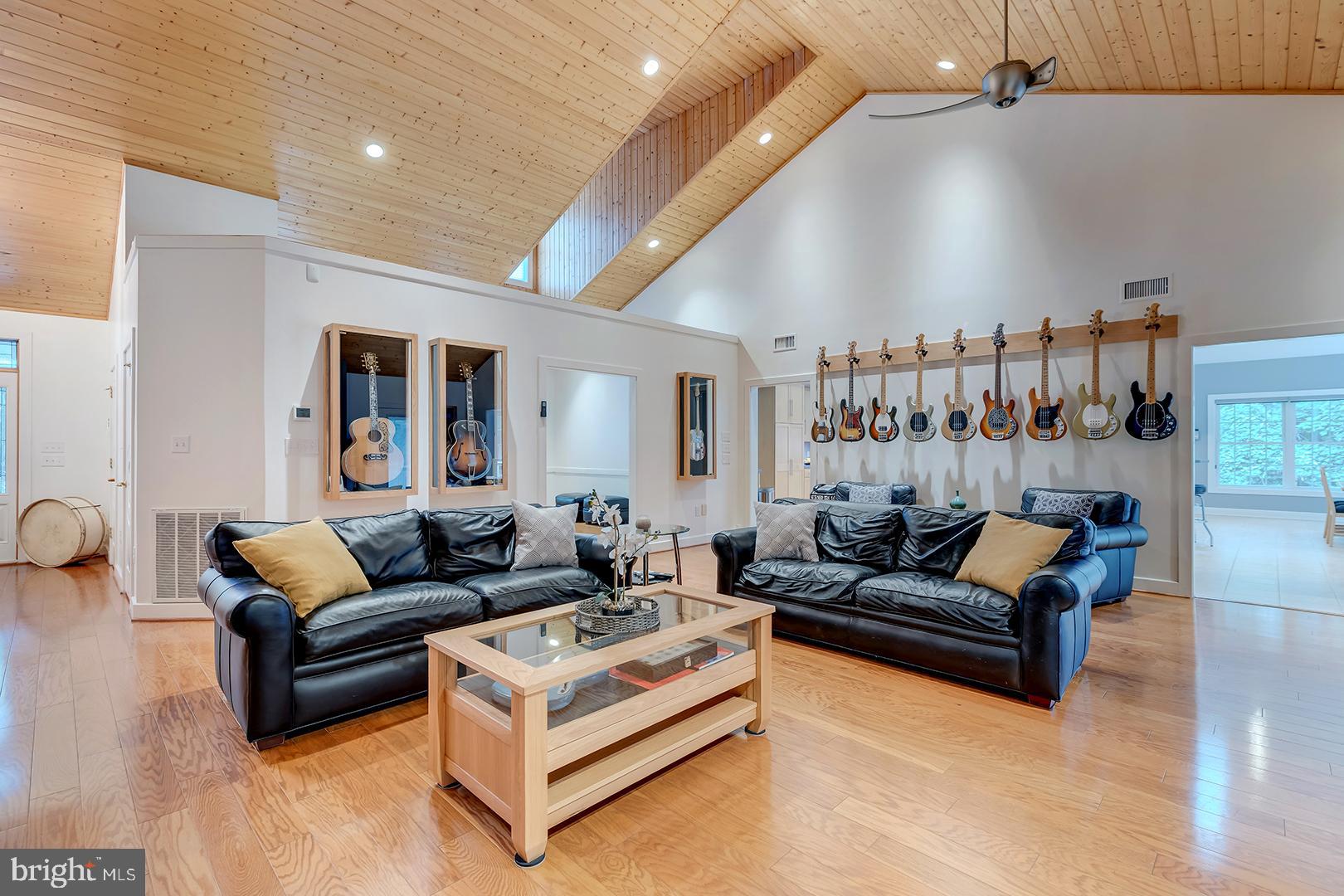 22095 Wilson Road Georgetown, DE 19947 - Photo 20 of 137 a living room with furniture and a wooden floor